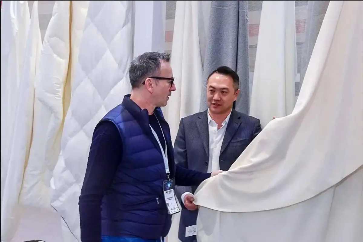 Funihe team and hospitality textile buyers at exhibition 8